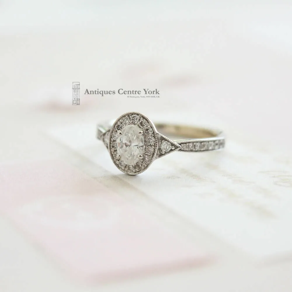 18ct White Gold Oval Diamond Halo Cluster Ring