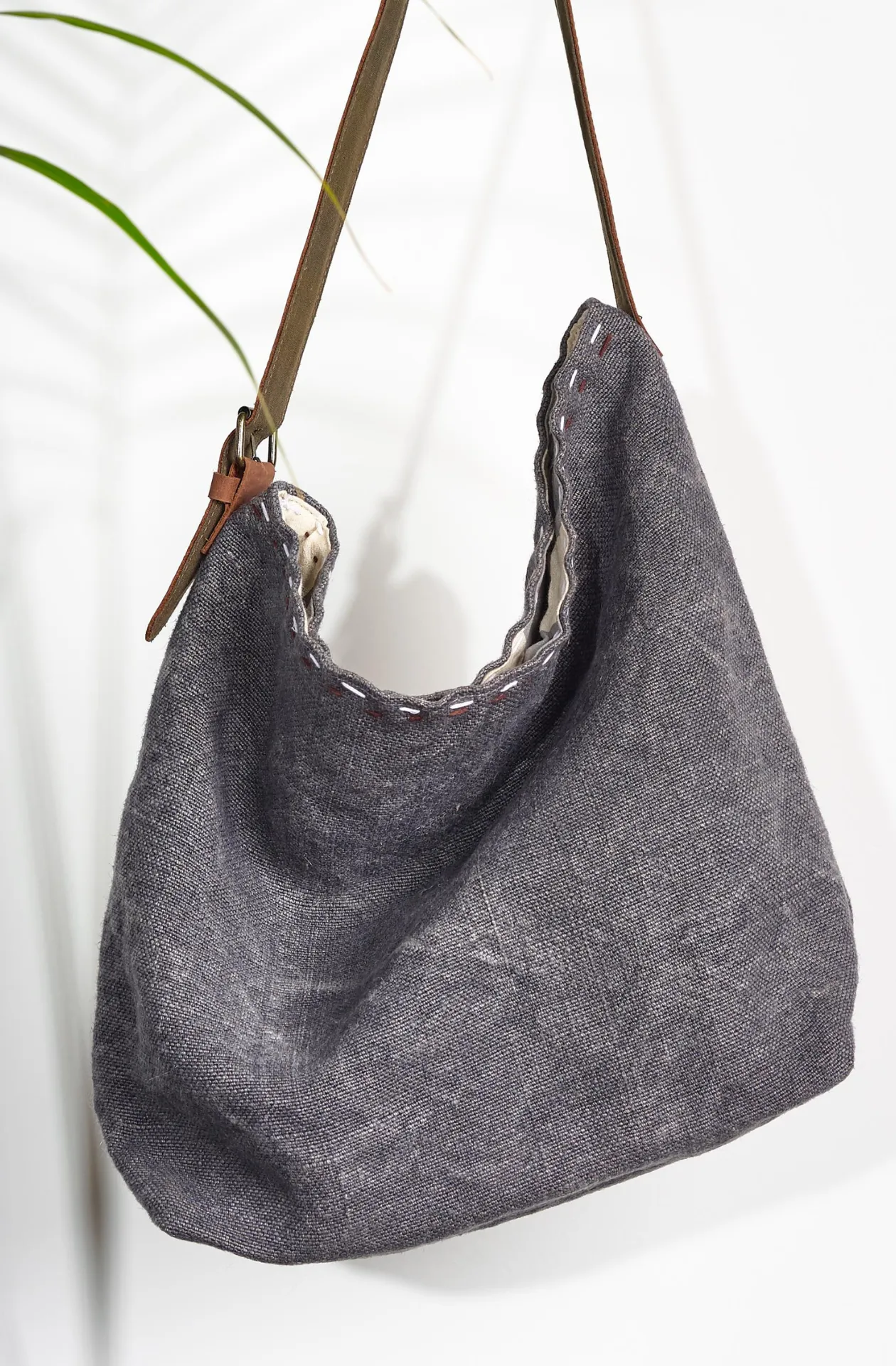 All The World Stonewashed Jute Bag with leather strap.